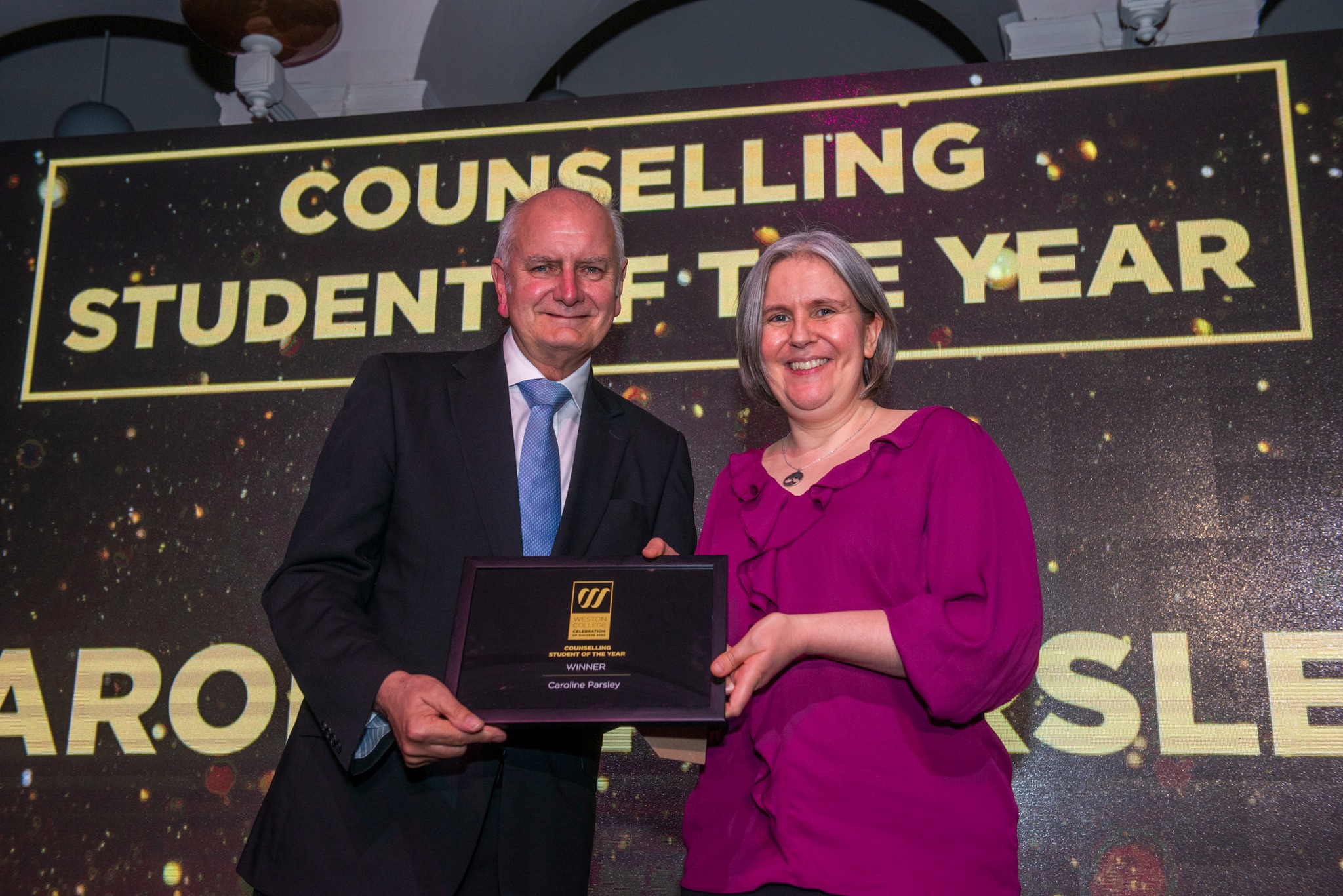 Caroline receiving Counselling Award