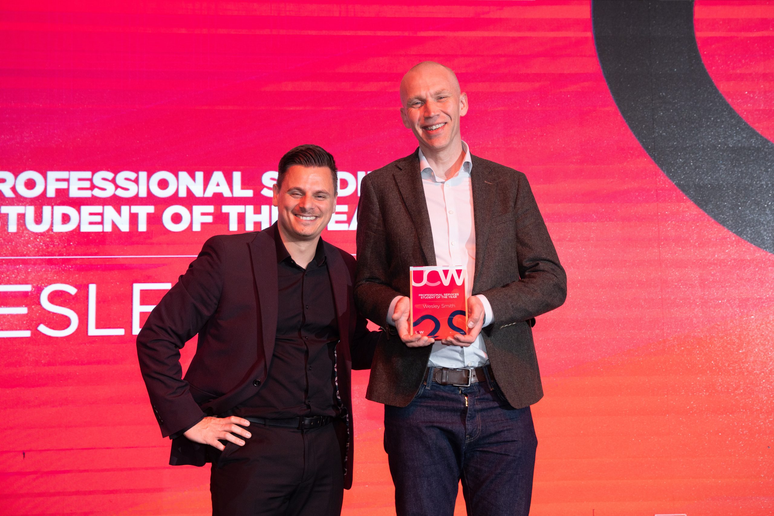 Wesley accepting the Professional Services Student of the Year Award