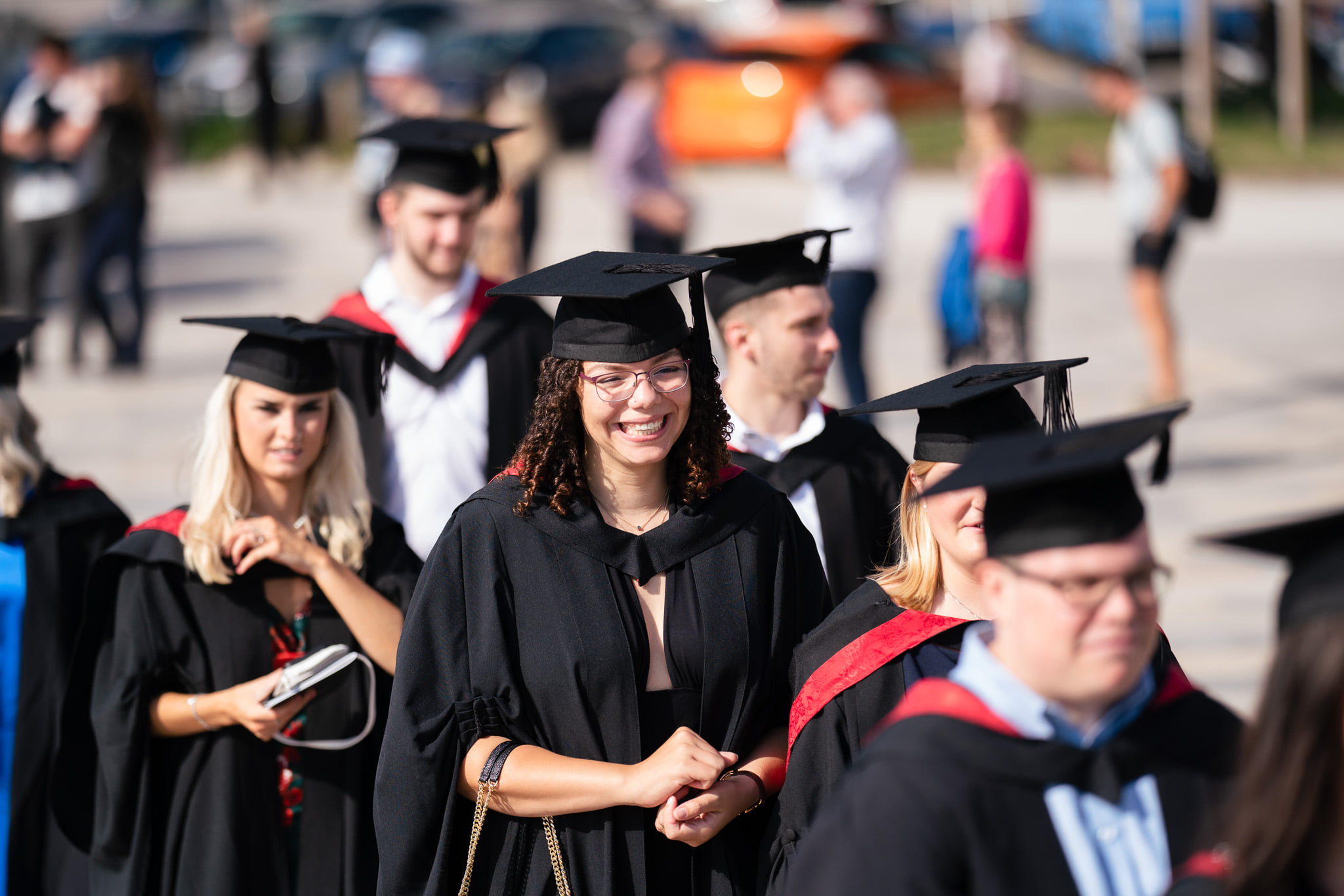smiling students graduating get degree in weston-super-mare somerset near bristol and bridgwater in my area
