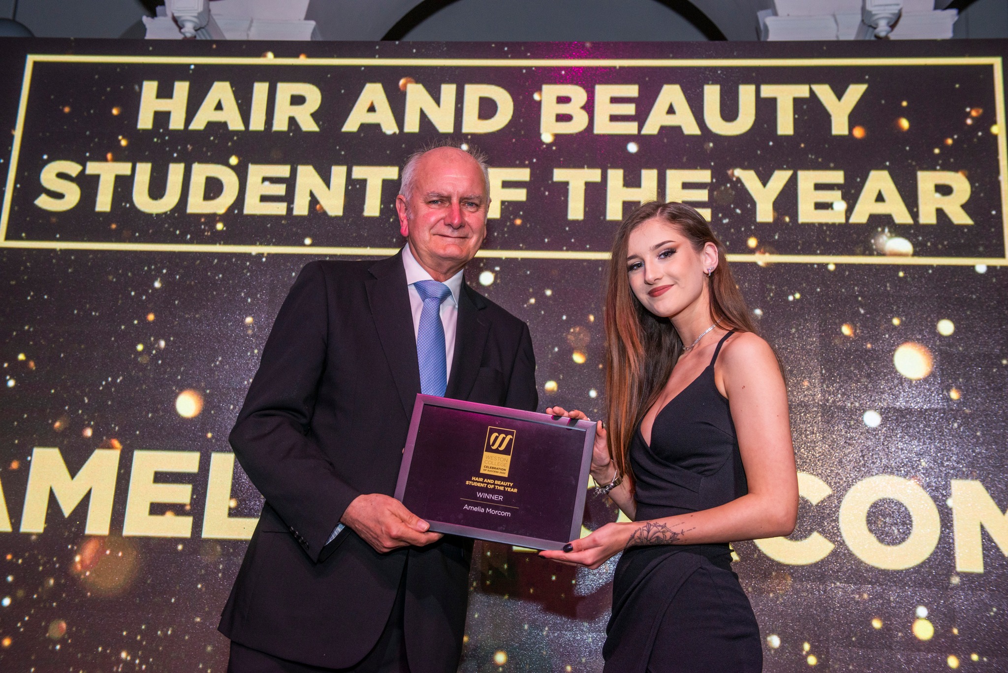 Amelia receiving Hair and Beauty award