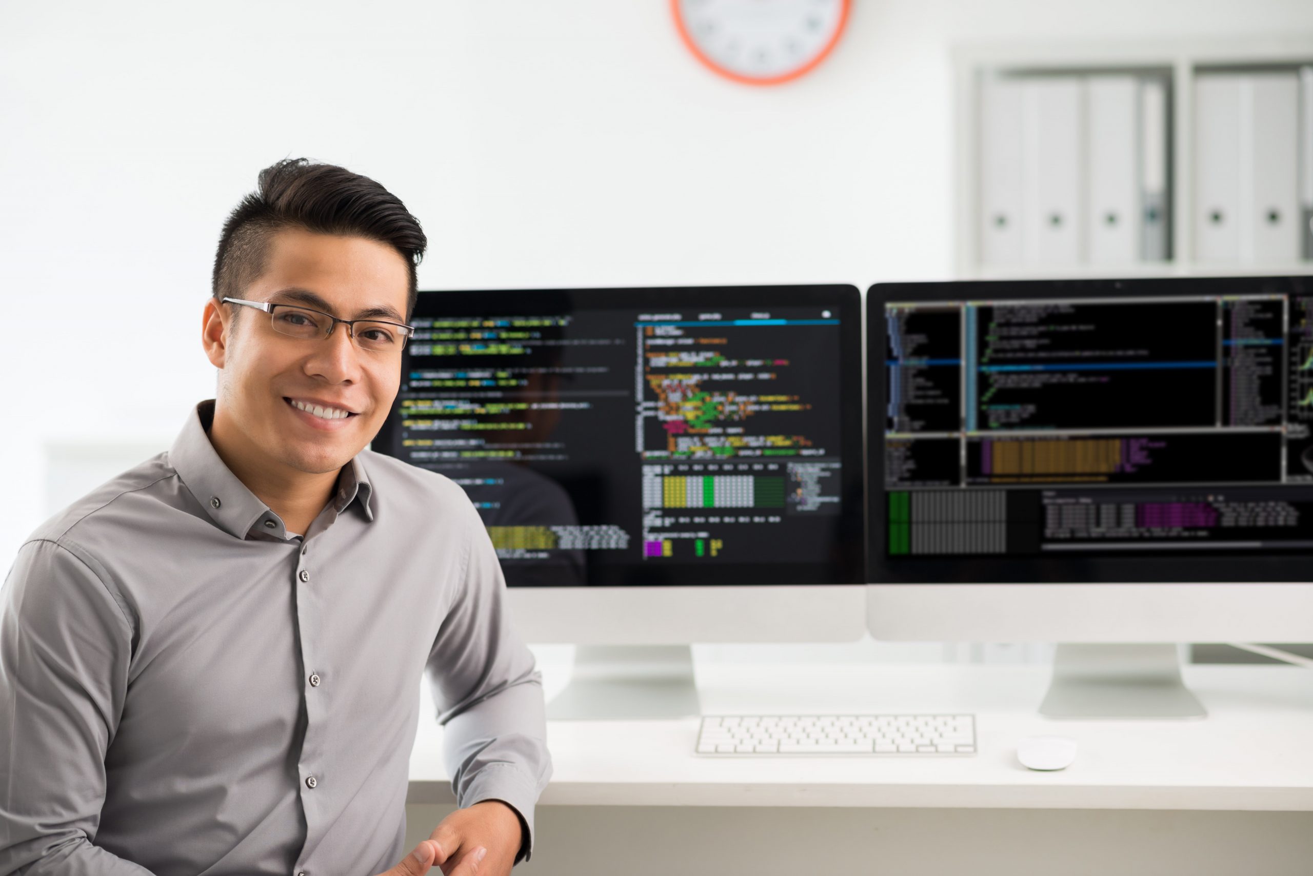 Guy infront of a computer-min