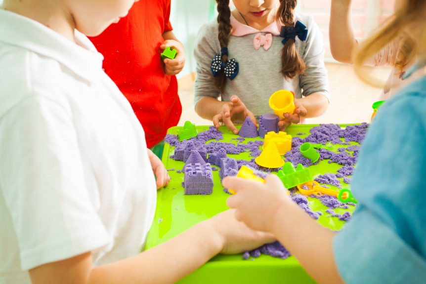 Children playing with sand at pre school
