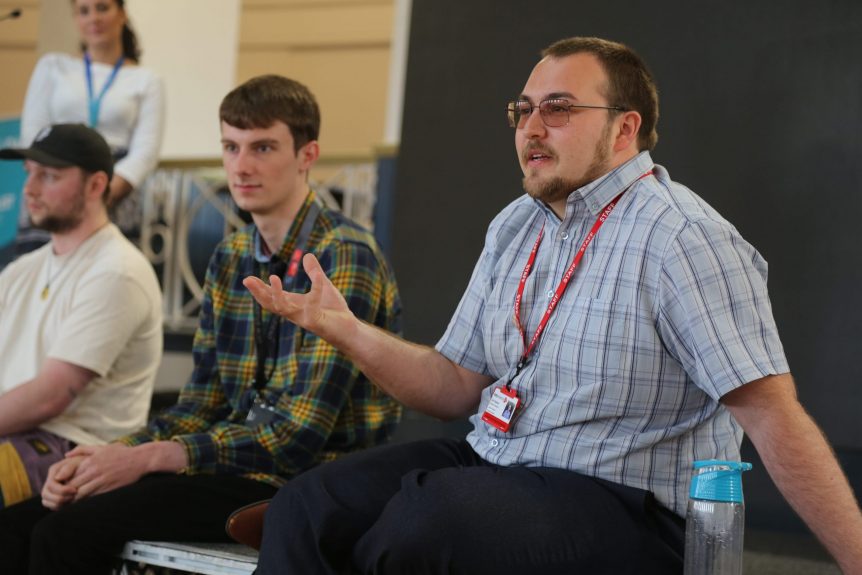 Early Years student talking to a room of people