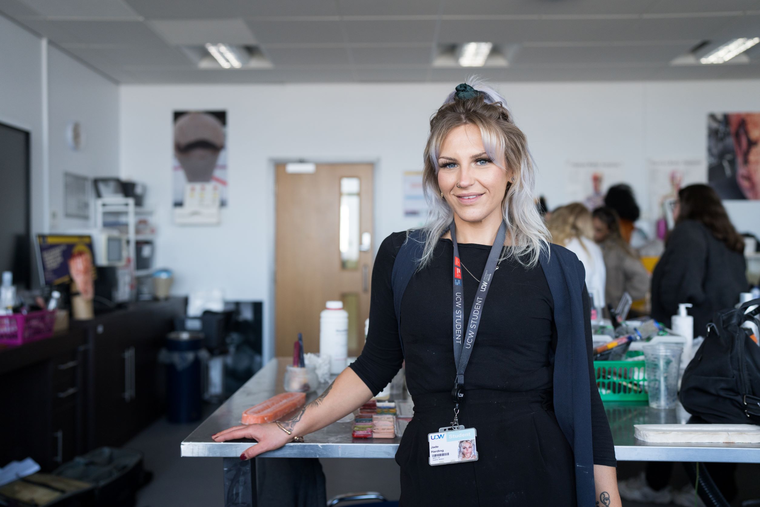 Female Hair, Makeup and Prosthetics for Production student smiling at the camera