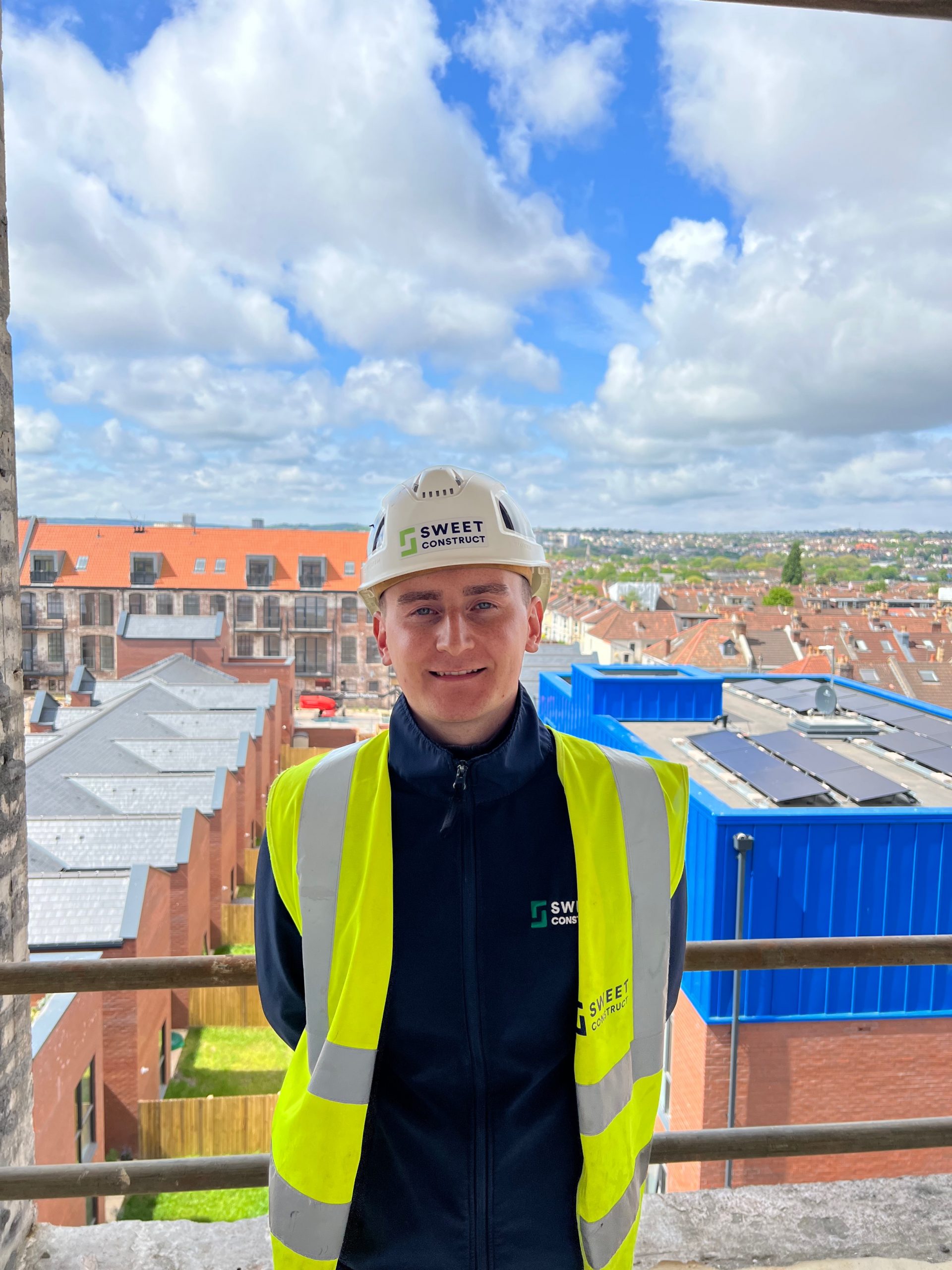 Construction student wearing high vis jacket and hard hat