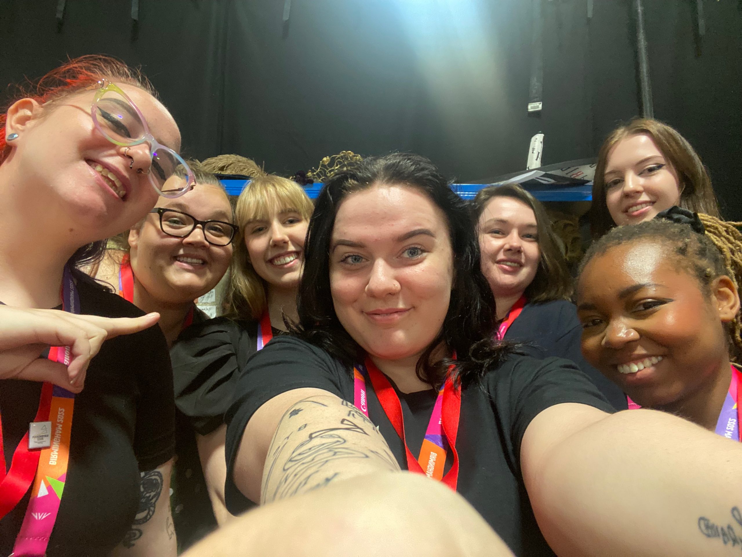 University make up stutents posing for a selfie at commonwealth games