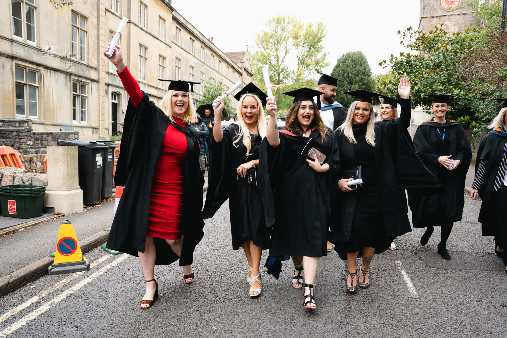 female students celebrating at university graduation