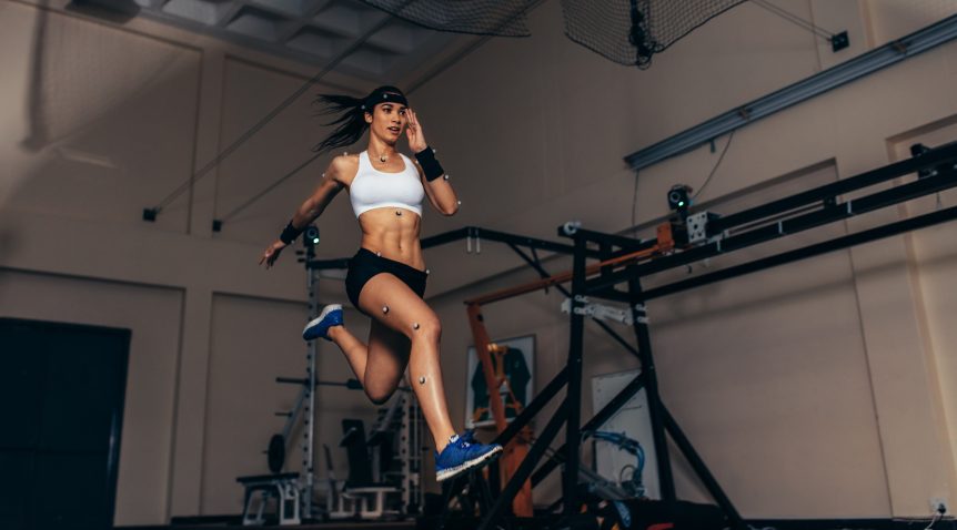 women running with motion sensors on her