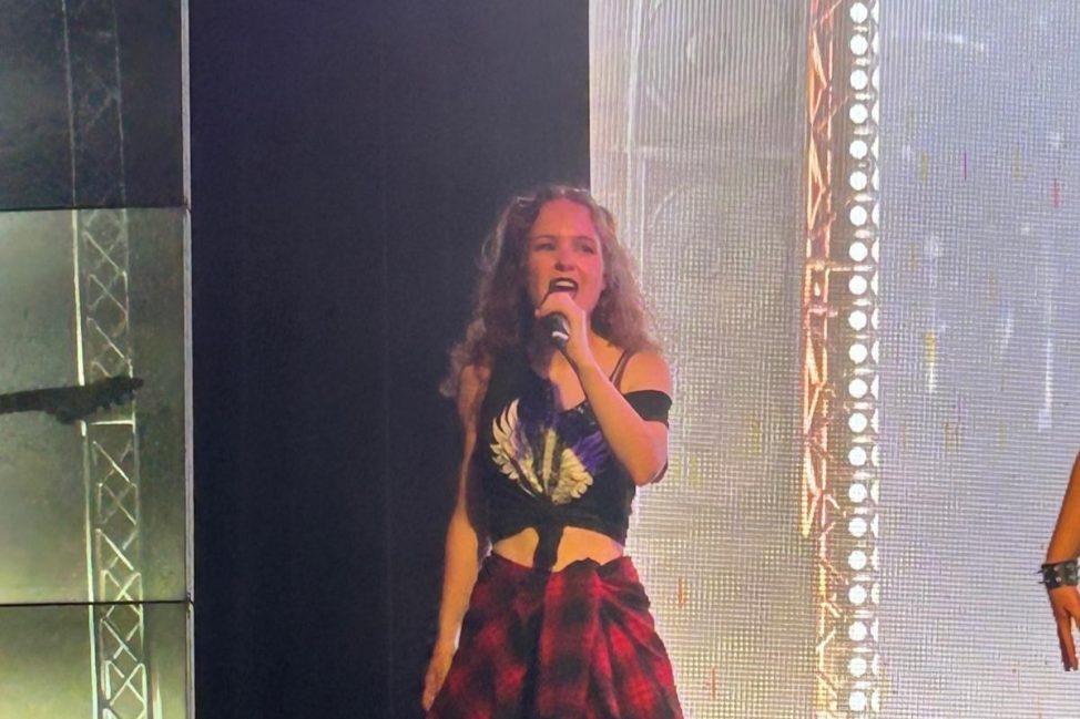 Emily performing at Away Resorts