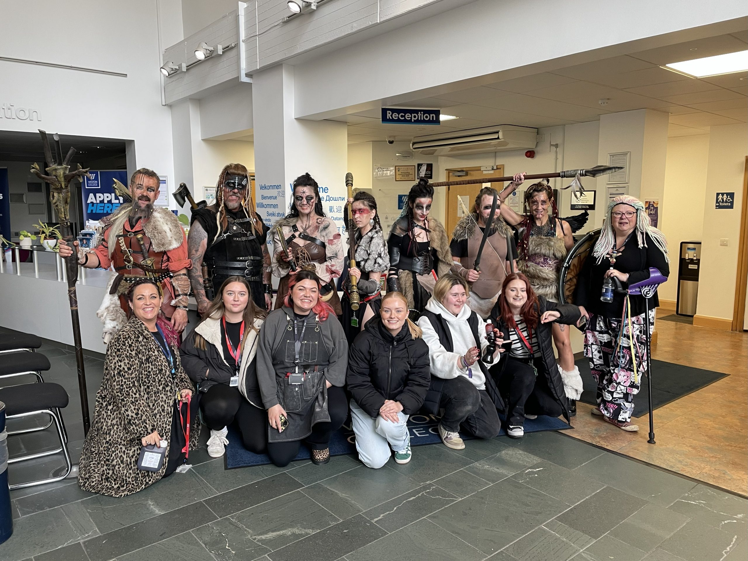 The students from Makeup, Wigs and Special Effects, with their models.