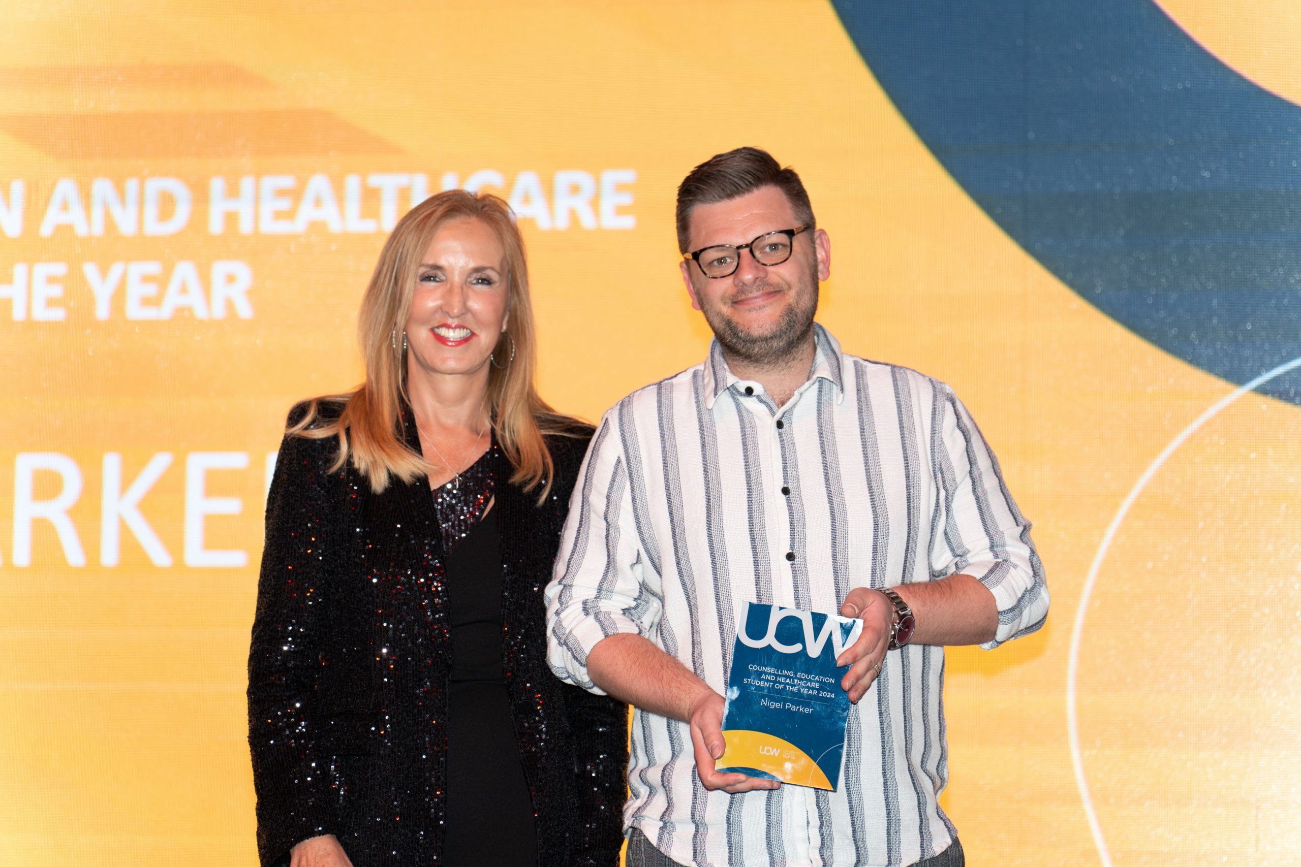 Nigel receiving an award.