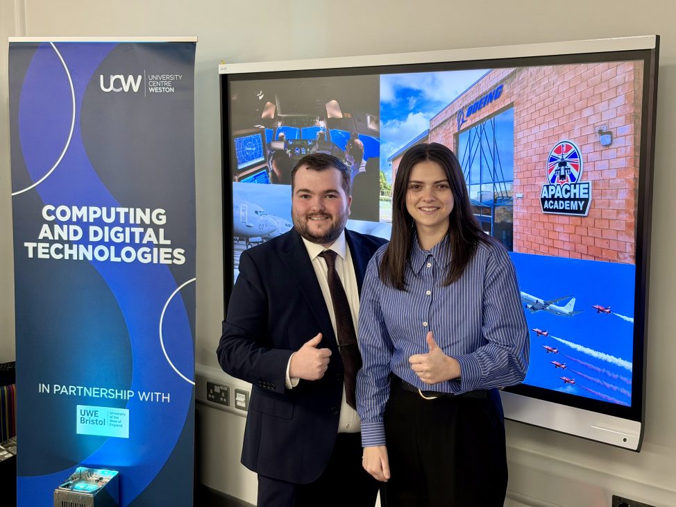 Mia and Lewis with their presentation