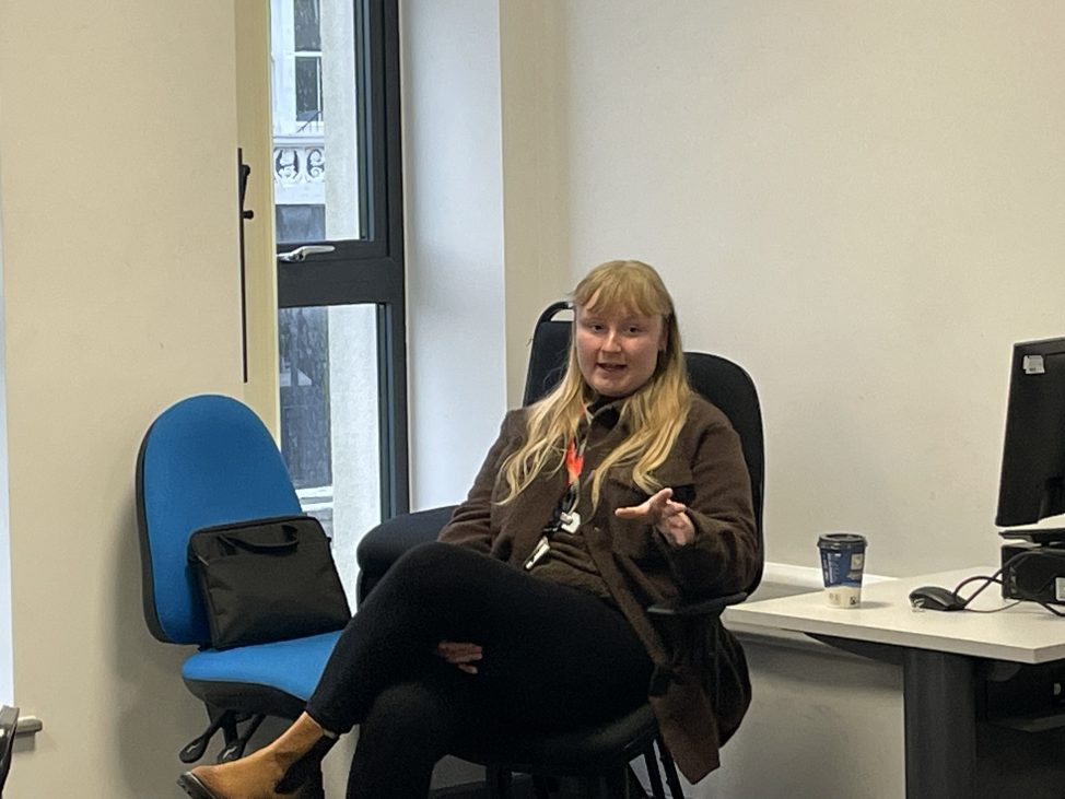 Jemma speaking to students